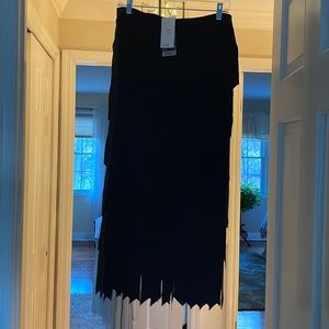 Pull on black sassy long skirt! Size S but I am an 8 and it fits me.
